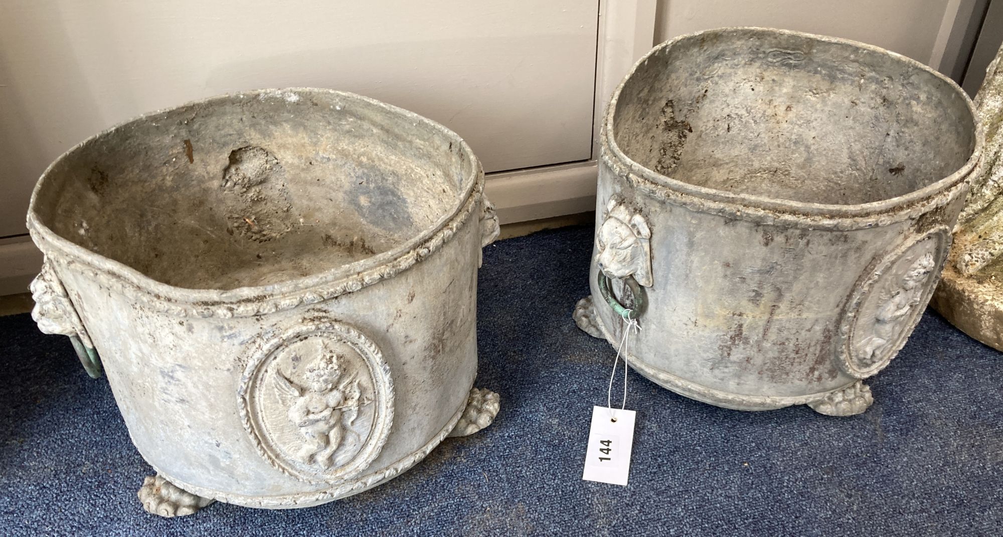 A pair of Victorian lead circular garden planters, 28cm diameter, height 22cm